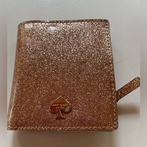 Kate Spade sparkly rose gold bifold wallet